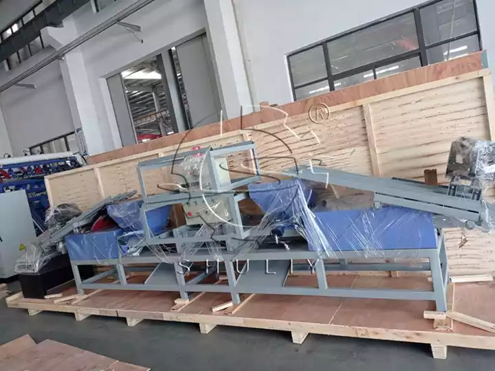 Machine de production de blocs de palettes en bois